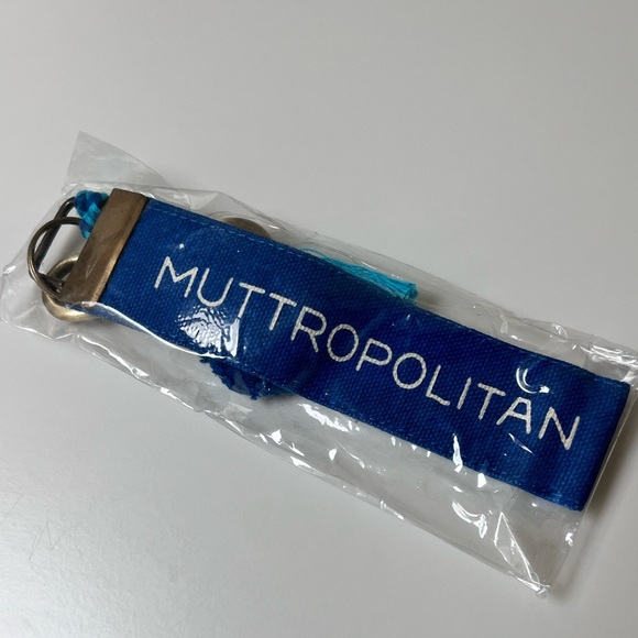 Dog lover keychain. ‘Muttropolitan.’ Antique brass clip. Pompoms. - Picture 2 of 4